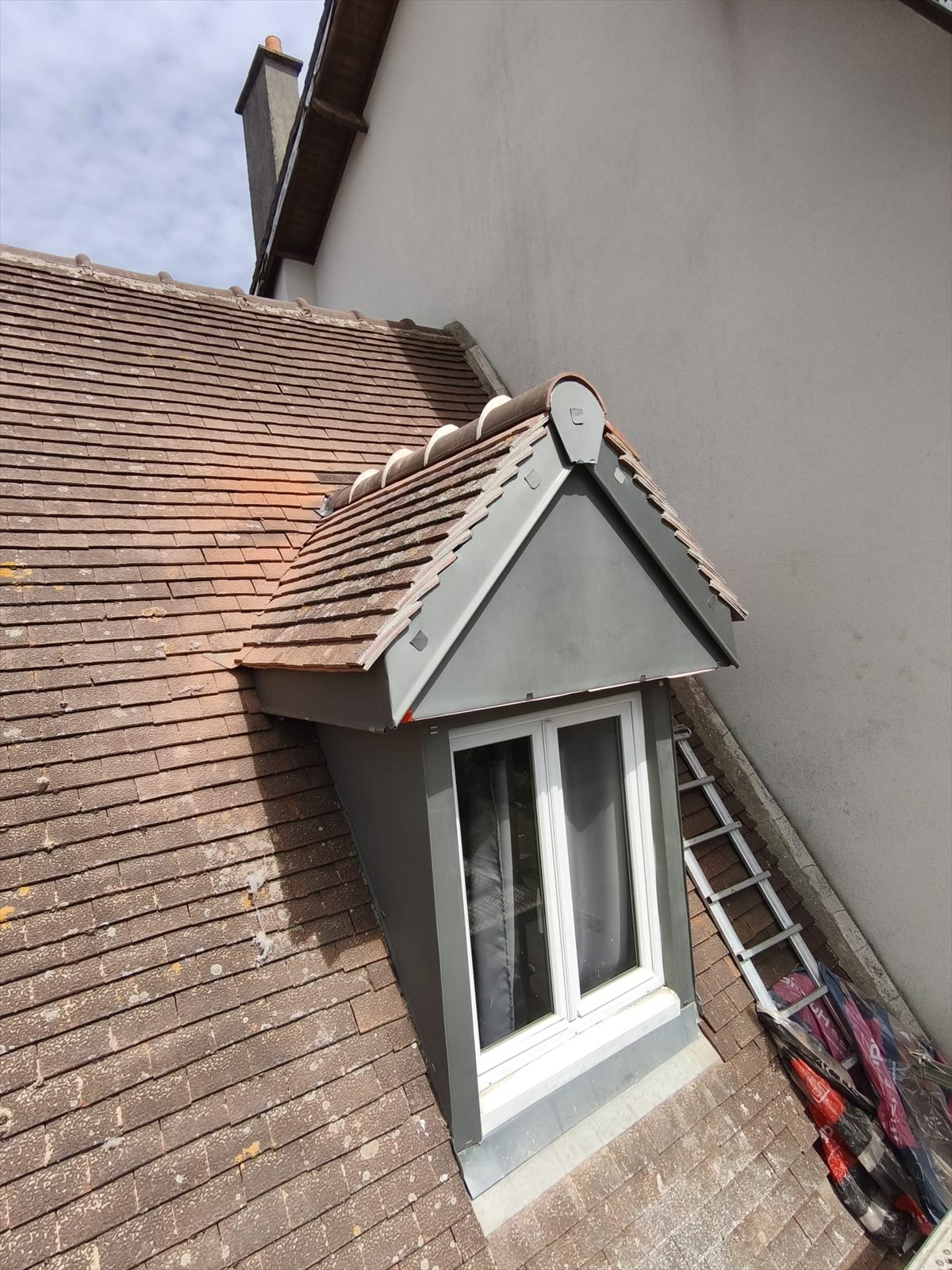 Finition de toiture et façade après intervention dans le 77